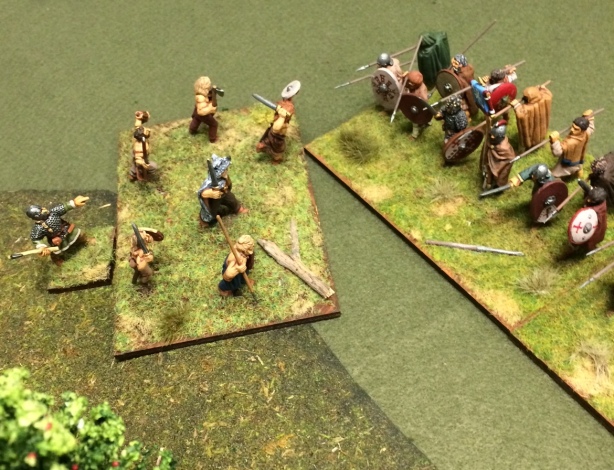 The fanatics charge out of the forest.